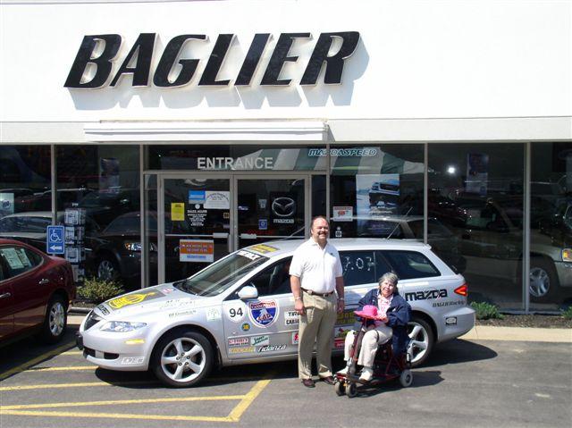 Dennis Baglier and Fay Teal in front of Baglier Mazda - Thanks Dennis